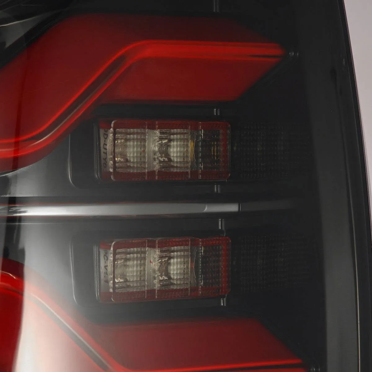 AlphaRex LUXX-Series Sequential Black-Red LED Tail Lights | 2016-2023 Toyota Tacoma (680000)